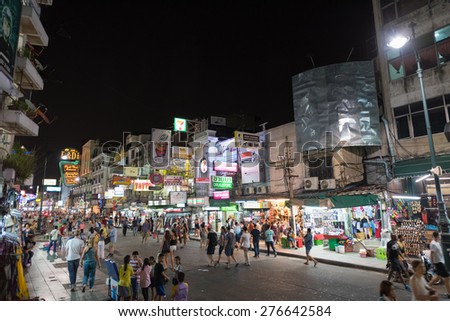 BANGKOK - MARCH 9, 2015: A lot of unidentified tourists walk, shop and eat in Khao San Road which is called the centre of the backpackers universe.