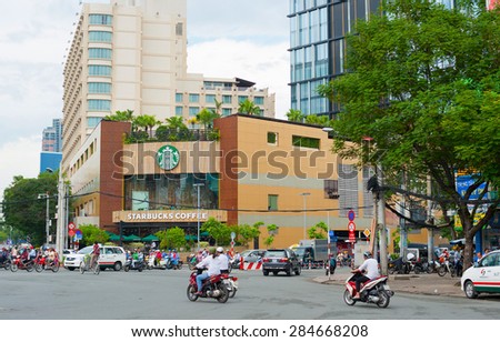 HO CHI MINH, VIETNAM - JULY 5, 2014: Starbucks coffee store facade in Le Lai Street. Starbucks is the largest coffeehouse company in the world with 23,305 stores in 65 countries and territories.