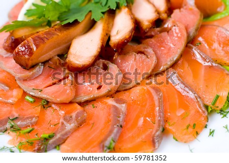 sliced smoked salmon and meat