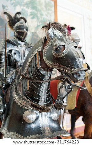 ST. PETERSBURG - JUNE 30, 2011: One of knights mannequins on horses at Knights Hall of the Hermitage. It hosts a part of the Hermitage Arsenal collection.