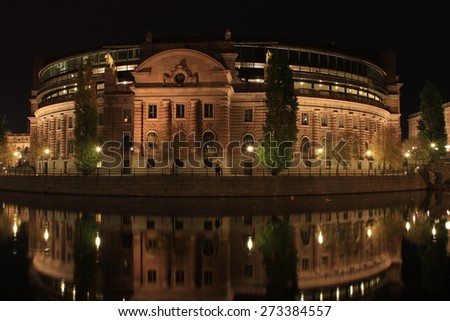Parliament Building in Stockholm, Sweden Reflected in Water in Late Evening