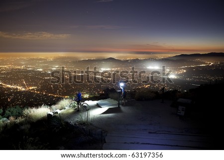 LOS ANGELES, CALIFORNIA - OCTOBER 12: Night time bike riders risk life and limb to reach breath taking night views on top of 3200\' Echo Mountain on October 12, 2010 in Los Angeles, California.