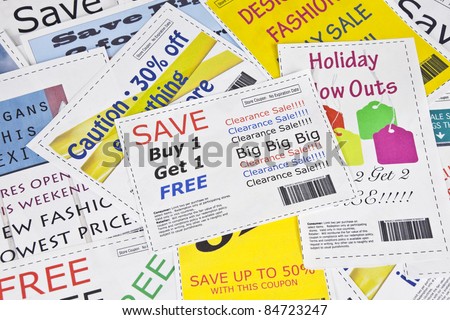 Completely fake fashion coupons with scissor.  Fictional bar codes.  All coupons were created by the photographer.  No real ads were used.  Photographs in the coupons are the photographers work.