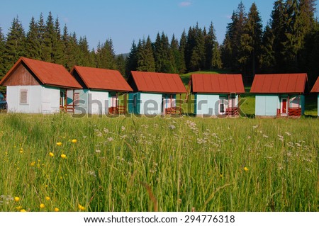 wooden huts in the mountains
