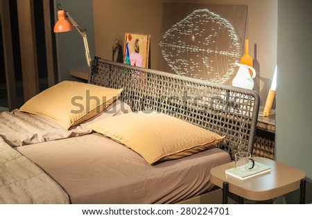 MILAN, ITALY - APRIL 16: View of bed displayed at Tortona space location of important events during Milan Design week on April 16, 2015