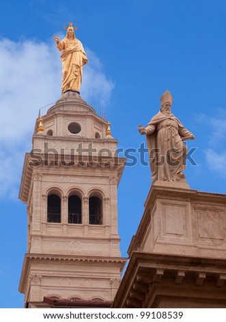 View of Jesus and St. Peter statues on the Basilica of the Sacred Heart of Jesus in Rome
