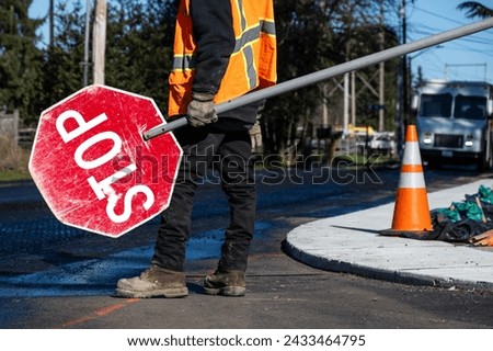 Similar – Image, Stock Photo Road construction worker with orange pants and shovel