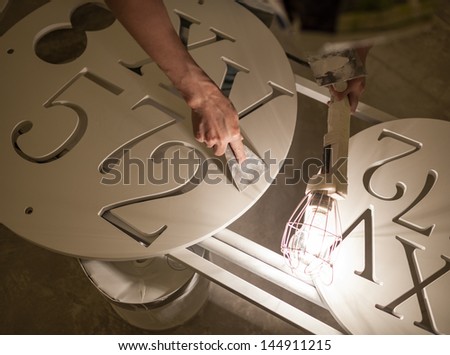 a worker was repairing decorative materials