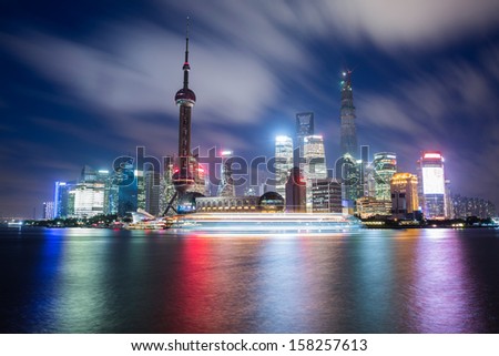 shanghai Pudong cityscape viewed from the bund, the beautiful city scenery, the trajectory of the light