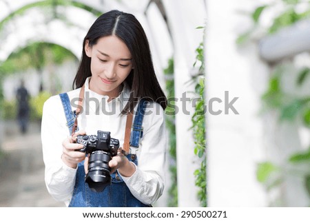 beautiful girl modulation photographic equipment, asian girl