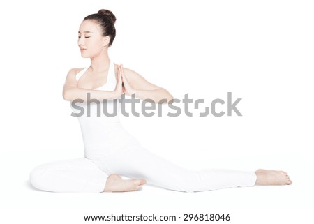 sporty girl on white background doing back bend asana for stretching neck