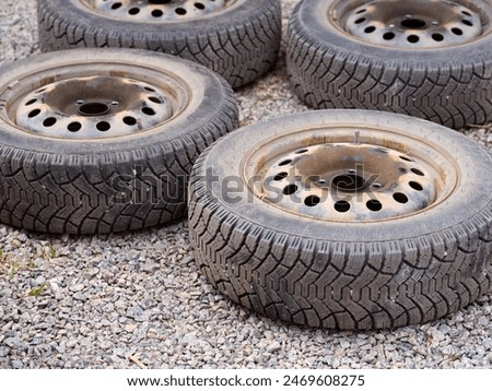 Similar – Image, Stock Photo car wheel lies on the side of the road covered with a thick layer of snow