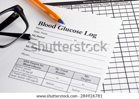 Blood Glucose Log and Monthly Blood Glucose Monitoring Diary with ballpoin pan and glasses.