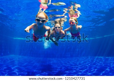 Similar – Image, Stock Photo Mother and son diving on a swimming pool