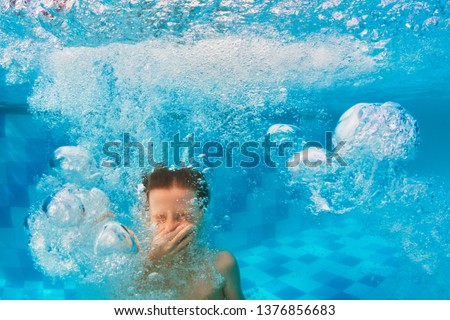 Similar – Image, Stock Photo Boy jumping and splashing in a pool