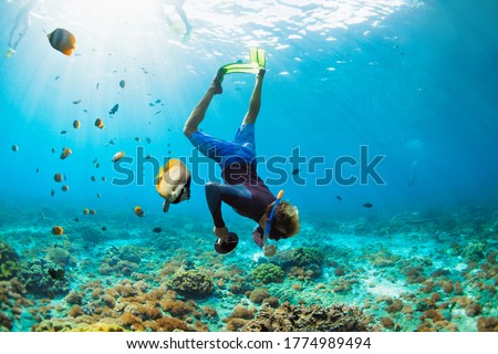 Similar – Image, Stock Photo Man swimming in clear water in sunlight
