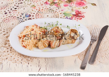 chicken legs in fat with couscous