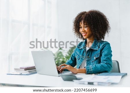 Similar – Image, Stock Photo African American lady using laptop in library to music