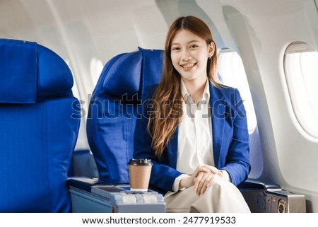 Similar – Image, Stock Photo Passenger looking at flight information board.