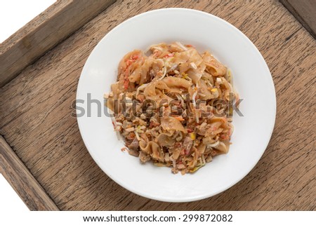 famous Thai fried rice noodles on grunge old wooden abstract background for food or dinner concept
