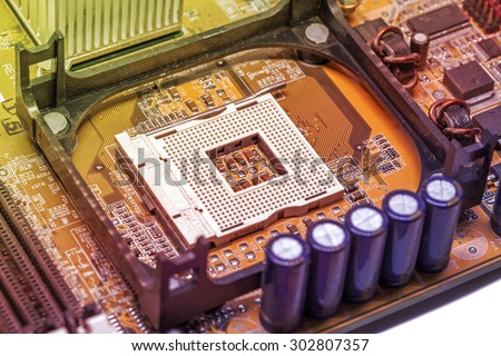 Close up vintage old CPU Processor socket with mainboard background color beautiful tone