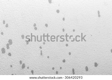 White concrete background cement textured with printer ink splash stain