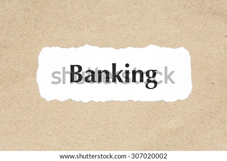 Banking word on white ripped paper on brown document texture
