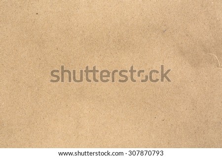 Old vintage brown cardboard paper texture for background