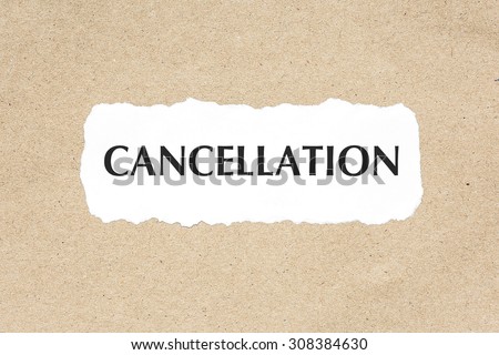 CANCELLATION word on white ripped paper on brown document texture