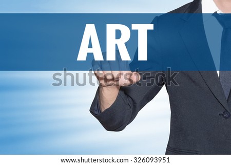 Business man touching Art word on blue virtual screen