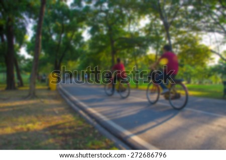 Abstract and blur background of people activities in park