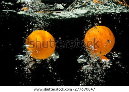 Orange Splash Under water , Fresh Fruit