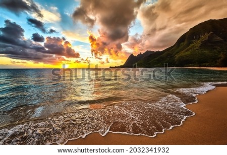 Sunrise on the sea beach. Beautiful sandy beach at dawn. Beautiful sunrise in beach. Sunrise on beach landscape
