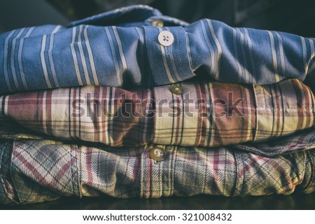 row of colorful man shirts vintage look