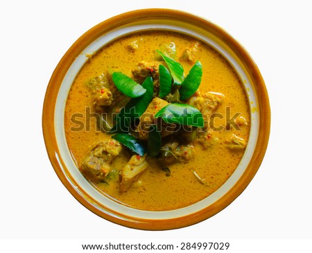 The spicy curry with chicken on white background.