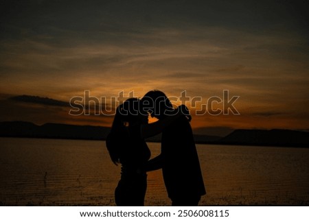 Similar – Image, Stock Photo Silhouette von einen Paar das sich kurz vor Sonnenuntergang auf einer Brücke trifft.