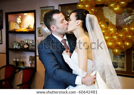 Romantic wedding kiss happy groom and bride