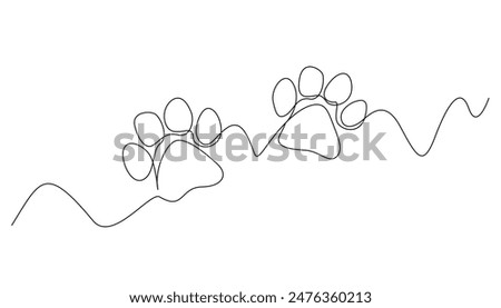 continuous line drawing of dog paw prints.abstract one line drawing of dog paw prints.isolated white background