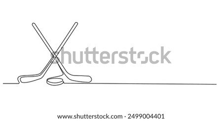 continuous line of hockey stick and hockey puck.icon of hockey stick and hockey puck crossed one line drawing.single line vector illustration.isolated white background