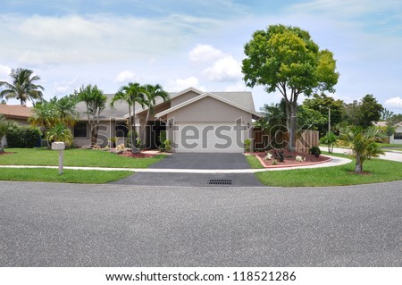 Suburban Home Snout Style Back Split architecture Palm Trees Blue Sky Clouds Day