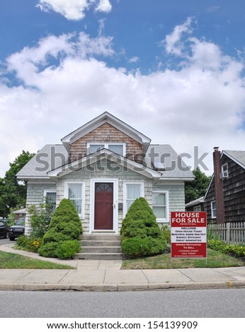 Real Estate for Sale Sign House For Sale Energy Efficient Great Amenities in Residential Suburban Home Neighborhood USA Blue Sky Clouds