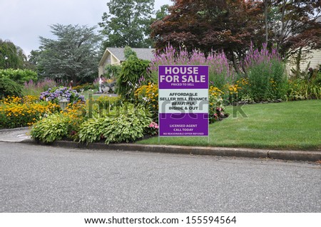 House for Sale Seller will Finance Real Estate Sign Suburban Front Yard Lawn Flower Garden residential neighborhood street usa
