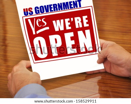 US Government Yes We're Open Paper in Hands of Politician