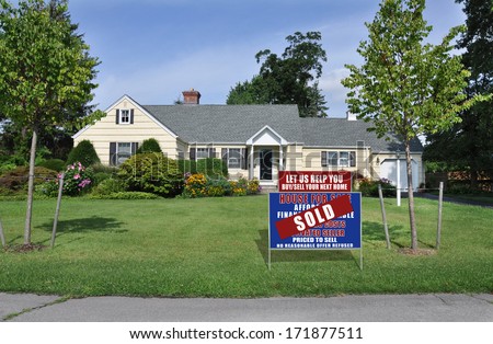 Sold Real Estate (let us help you buy sell your next home) sign suburban home landscaped flowers trees plants residential neighborhood street usa blue sky clouds