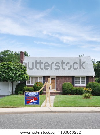 Mannequin demonstrating Sold Real Estate Sign (another success let us help you buy sell your next home) suburban bungalow style brick home residential neighborhood usa blue sky clouds
