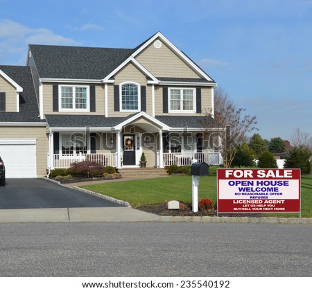 Real Estate for sale sign open house welcome sign Suburban Mcmansion home residential neighborhood USA