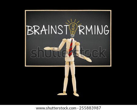 Ideas Light Bulb Brainstorming Blackboard Mannequin isolated on black background