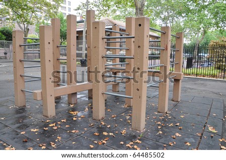 Urban City Wood Playground Jungle Gym Exercise Equipment on Wet Day