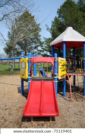 Playground Red Slide Little Boy Climbing Down in Background