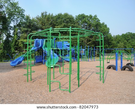 Empty Playground Monkey Bars Slide in Background Suburban Neighborhood